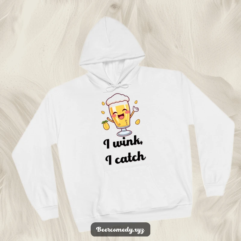 Funny delighted beer glass with a joyful wink catching a falling hop, featured on a warm hoodie, combining coziness with cheerful, serendipitous moments.
