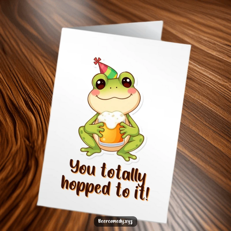 Funny Free Printable Congratulations Card: A happy frog in a party hat holds a frothy mug, celebrating success with joy.